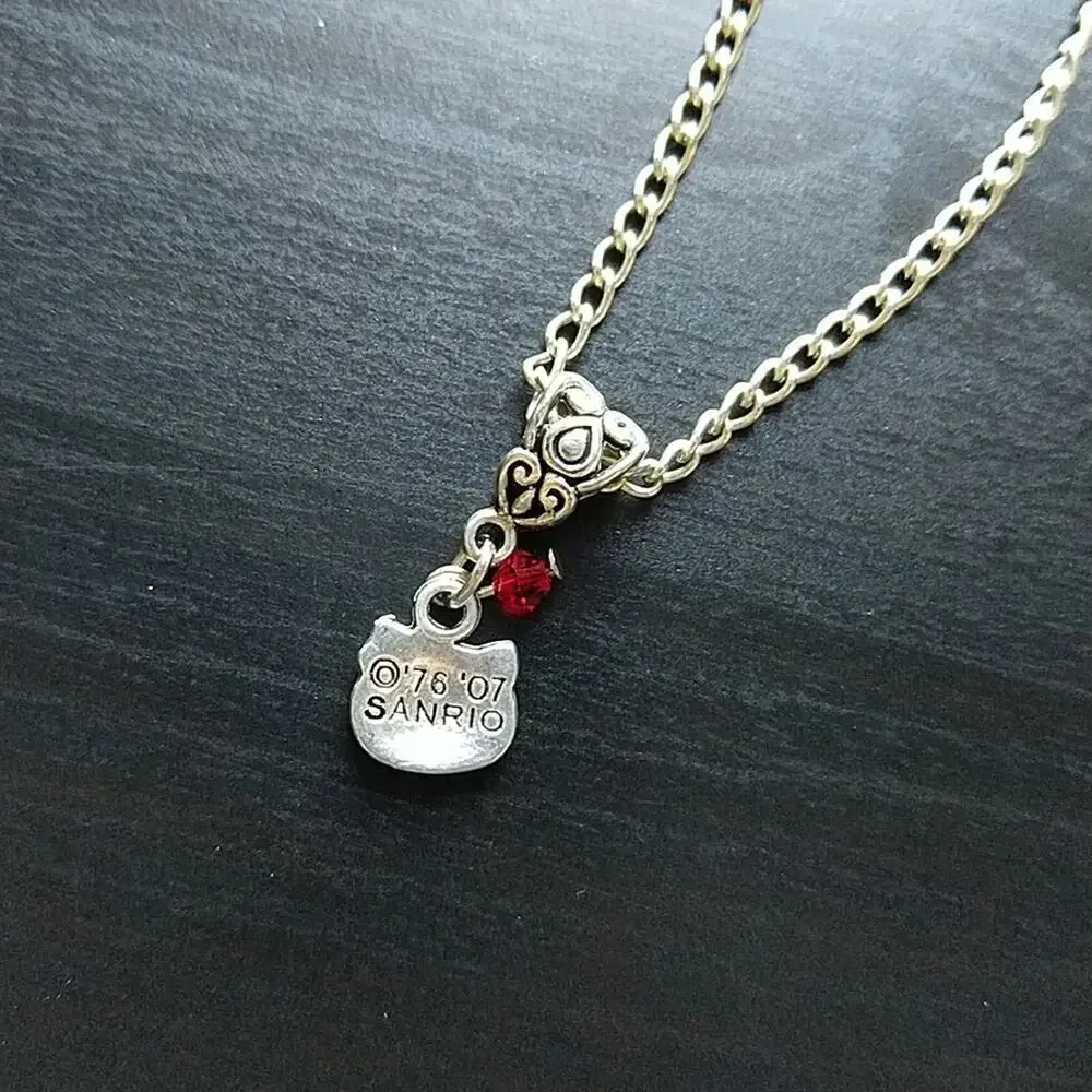 Anklet, Hello Kitty Silver tube bail red bead 12